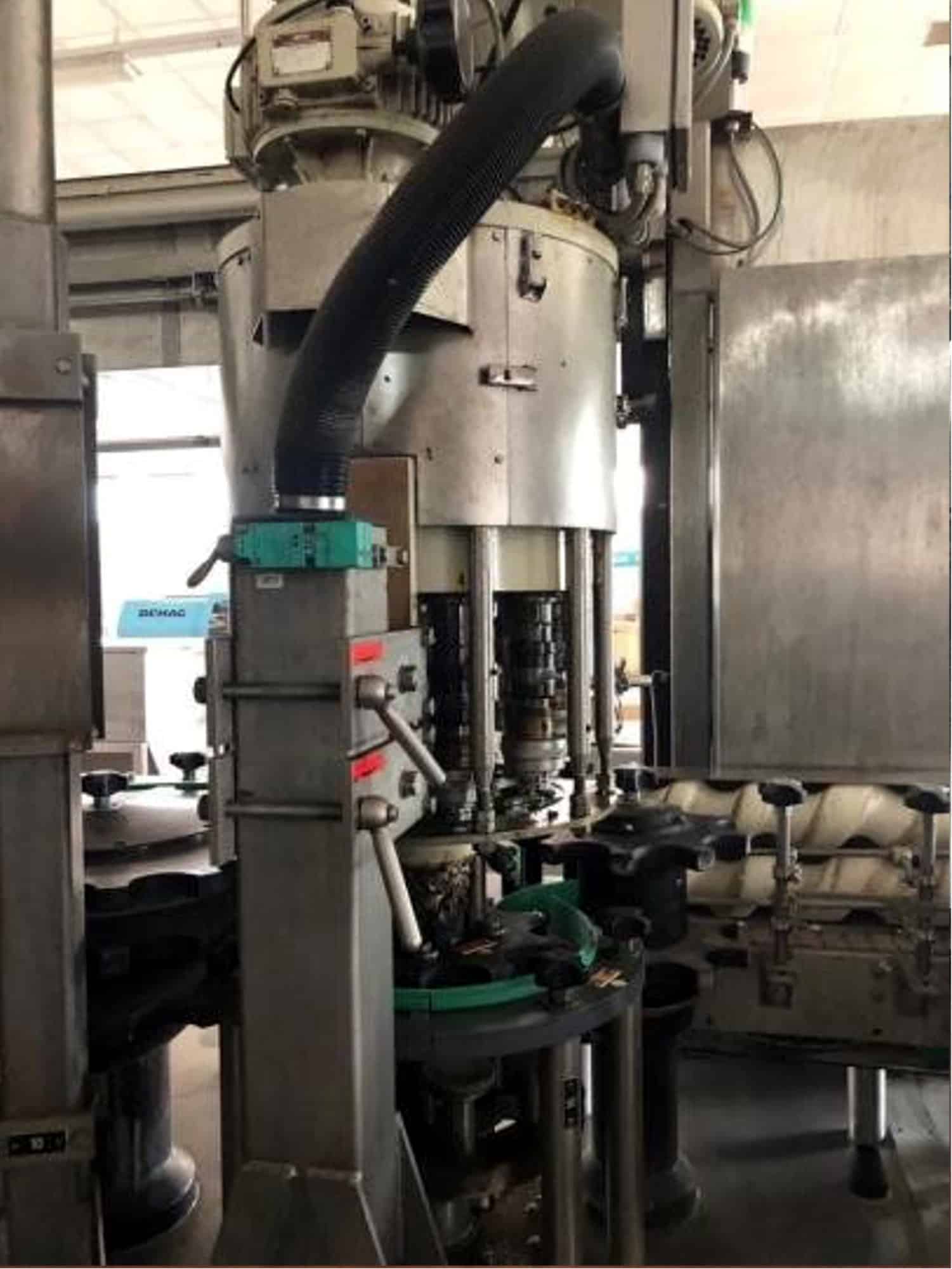 منظر جانبي ل Krones TriBlock (جهاز شطف، حشو، كابر) 